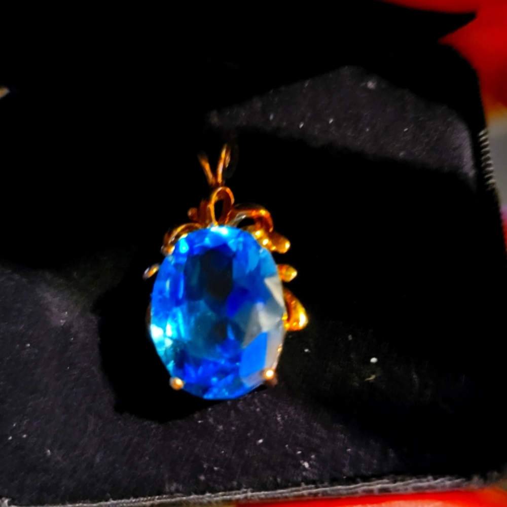 10k wrapped in blue topaz lab created 2k